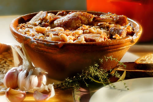 Authentic Castelnaudary Cassoulet, a traditional French bean and duck confit stew, served at Domaine des Périès boutique guesthouse