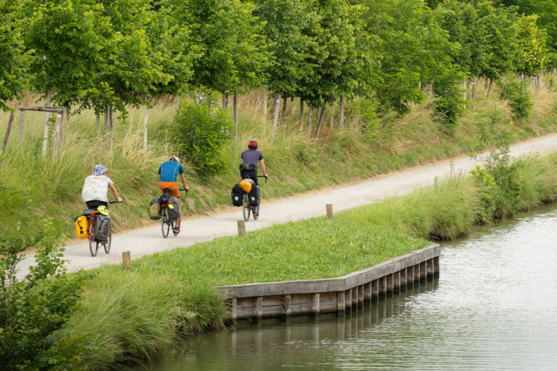 Cycling along the Canal du Midi near Castelnaudary