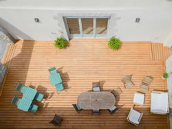 Top view of the terrace seating area, a perfect spot for conviviality at Domaine des Périès