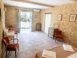 Authentic decor and desk area under a vaulted ceiling in the restored former stable