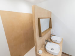 Sleek design and contemporary details of the private en-suite bathroom